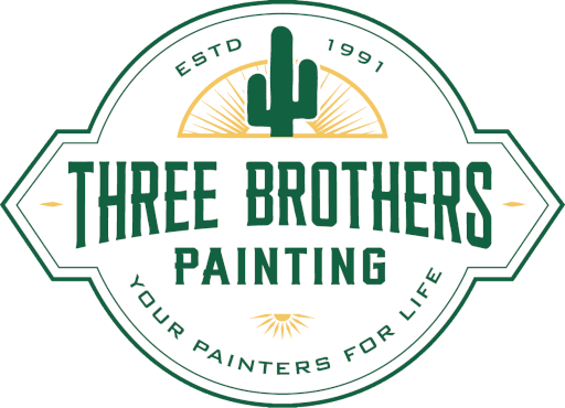 Three Brothers Painting Logo, features the date established at the top, Three Brothers Painting text in the middle, and Your Painters for Life at the bottom all in green text. Near the top is a green cactus with a golden sunset in the background.